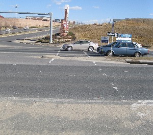 Car blocking highway crosswalk
